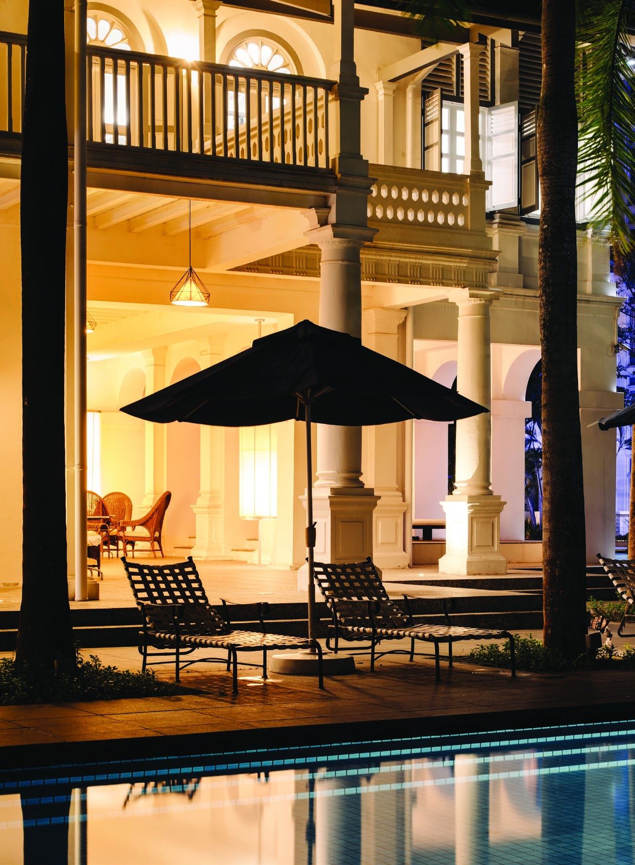 The restored colonial clubhouse at dusk